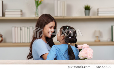 Mother and daughter sharing a heartfelt moment at home Mother and daughter sharing a heartfelt moment at home 138388890