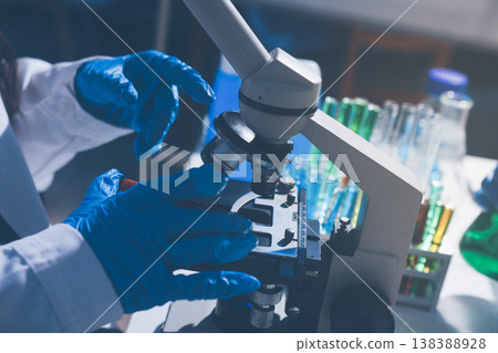 Science, laboratory and woman with pipette, test tube and biotech solution in research. Medical innovation, scientist or lab technician in study for healthcare, medicine and vaccine results feedback. Science, laboratory and woman with pipette, test tube and biotech solution in research. Medical innovation, scientist or lab technician in study for healthcare, medicine and vaccine results feedback. 138388928