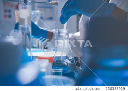 Science, laboratory and woman with pipette, test tube and biotech solution in research. Medical innovation, scientist or lab technician in study for healthcare, medicine and vaccine results feedback. Science, laboratory and woman with pipette, test tube and biotech solution in research. Medical innovation, scientist or lab technician in study for healthcare, medicine and vaccine results feedback. 138388929