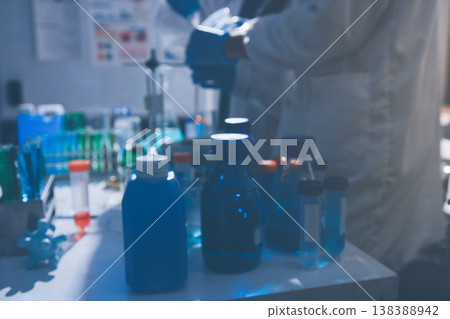 Science, laboratory and woman with pipette, test tube and biotech solution in research. Medical innovation, scientist or lab technician in study for healthcare, medicine and vaccine results feedback. 138388942