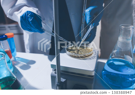 Science, laboratory and woman with pipette, test tube and biotech solution in research. Medical innovation, scientist or lab technician in study for healthcare, medicine and vaccine results feedback. Science, laboratory and woman with pipette, test tube and biotech solution in research. Medical innovation, scientist or lab technician in study for healthcare, medicine and vaccine results feedback. 138388947