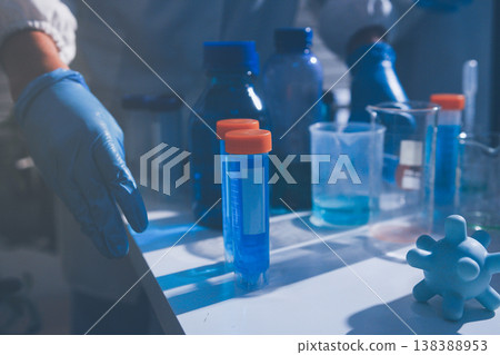 Science, laboratory and woman with pipette, test tube and biotech solution in research. Medical innovation, scientist or lab technician in study for healthcare, medicine and vaccine results feedback. 138388953