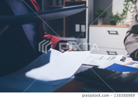 Diverse business people having a team meeting in an office Diverse business people having a team meeting in an office 138388989