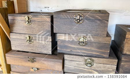 Charming hand-painted decorative wooden birdhouses with floral patterns on display in a spring gift shop Charming hand-painted decorative wooden birdhouses with floral patterns on display in a spring gift shop 138391084