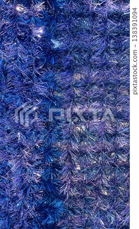 Full frame background of shimmering blue and violet metallic tinsel with festive sparkling texture 138391094