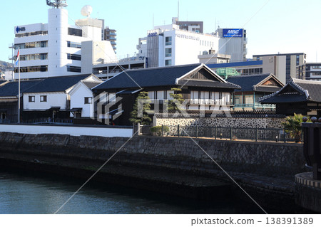A view of the central urban area of Nagasaki City, specifically the Dejima area. A view of the central urban area of Nagasaki City, specifically the Dejima area. 138391389