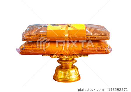 Kathin fabric, Kathin ceremony, Buddhist monk dresses in a carved tradition pearl tray with clipping path on isolated background monk robe, orange robe, buddhist monk robe, isolated background, 138392271