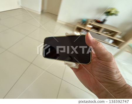 I tried using a convenient selfie stick with my smartphone. I tried using a convenient selfie stick with my smartphone. 138392747