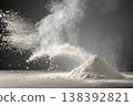 White flour powder explosion in air on dark background with dramatic motion 138392821