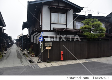 Old townscape of Takayama City, Gifu Prefecture, Japan. Old houses exuding a sense of history. Morning scene during the Takayama Spring Festival. Old townscape of Takayama City, Gifu Prefecture, Japan. Old houses exuding a sense of history. Morning scene during the Takayama Spring Festival. 138392892