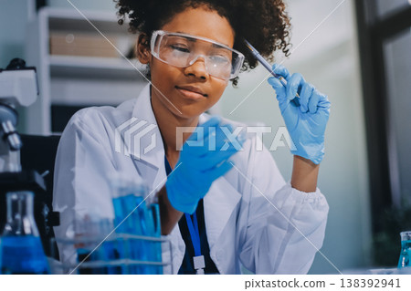 Researchers working in the clinical laboratory Researchers working in the clinical laboratory 138392941