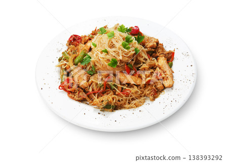 Asian food. Fried Thai Rice noodles with meat and vegetables. Chinese rice vermicelli with meat, parsley and peppers. 138393292