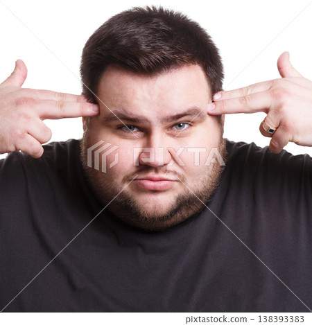 Stressed exhausted man with fingers on temple suffering from headache, white isolated studio background 138393383