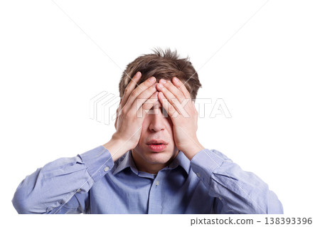I'm sick of it. Shocked man covering face with palms, expressing aggression or fear, white isolated studio background I'm sick of it. Shocked man covering face with palms, expressing aggression or fear, white isolated studio background 138393396