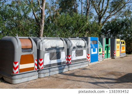 Colorful recycling containers for waste separation in outdoor environment sustainable waste management and eco friendly lifestyle concept Colorful recycling containers for waste separation in outdoor environment sustainable waste management and eco friendly lifestyle concept 138393452