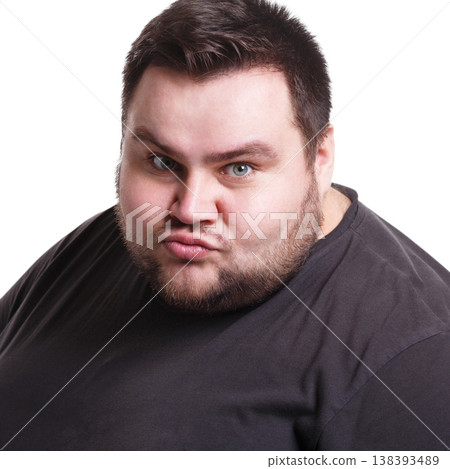 Feeling furious. Fat man expressing anger, white isolated studio background 138393489