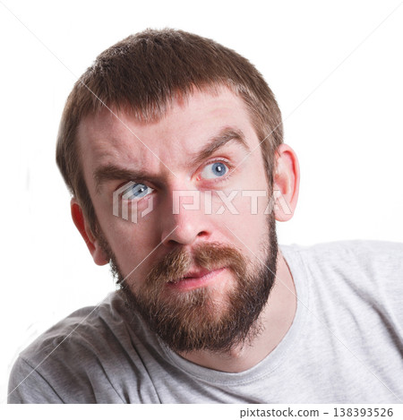 Suspicious. Worried man thinking about problem, searching solution, white isolated studio background Suspicious. Worried man thinking about problem, searching solution, white isolated studio background 138393526