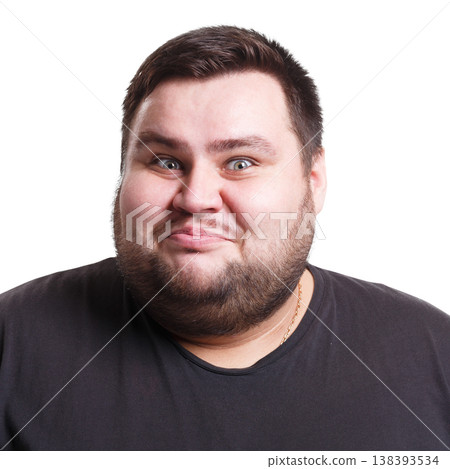 Pleasant news. Excited man expressing shock on face, smiling on white isolated studio background, portrait Pleasant news. Excited man expressing shock on face, smiling on white isolated studio background, portrait 138393534