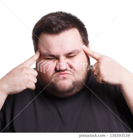 Overworking. Stressed fat man with fingers on temple suffering from headache, white isolated studio background 138393539