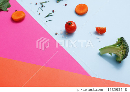 Diet, detox and healthy food concept - top view flat lay of fresh organic raw vegetables on abstract bright background. Ingredients for salad - broccoli, mushroom, carrot, cherry tomato, spinach 138393548