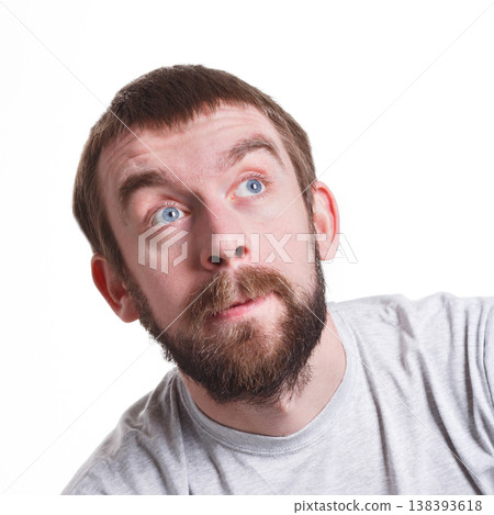 Lost in thoughts. Thoughtful serious man thinking about problem, searching solution, white isolated studio background Lost in thoughts. Thoughtful serious man thinking about problem, searching solution, white isolated studio background 138393618
