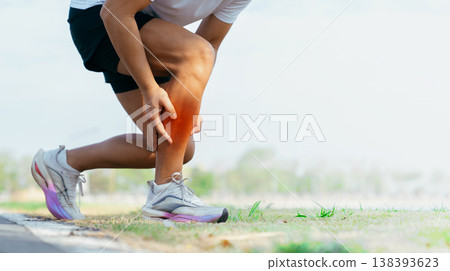Runner Holding Painful Knee After Running Exercise 138393623
