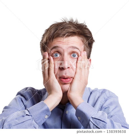Shocking news. Shocked man emotional, expressing amaze on face, standing on white isolated background, studio shot 138393638