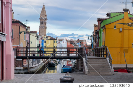 Colorful canal street with boats and bell tower Colorful canal street with boats and bell tower 138393640