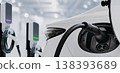 Electric Car Charging Station with EV Plug Connected to Vehicle 138393689