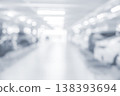 Abstract Blurred Parking Garage Background with Cars and Light 138393694