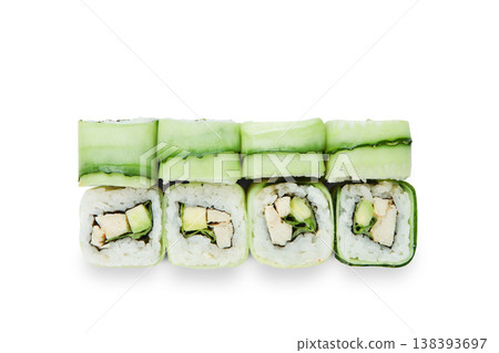 Japanese food restaurant delivery - vegetarian sushi rainbow rolls california with cucumber, avocado and cheese isolated at white background. Sushi rolls top view, flat lay. 138393697