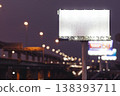 Blank billboard mockup on highway at night with bokeh lights 138393711