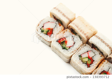 Sushi japanese restaurant delivery. Set of unagi eel rolls isolated on white background closeup, copy space. Healthy seafood, cutout for menu Sushi japanese restaurant delivery. Set of unagi eel rolls isolated on white background closeup, copy space. Healthy seafood, cutout for menu 138393712