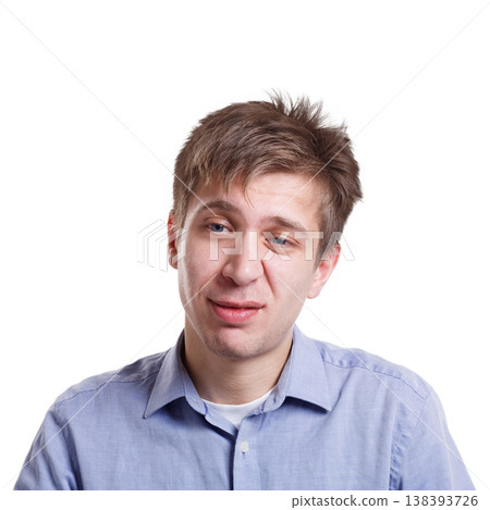 Emotions, facial expressions. Man expressing disgust while standing on white isolated studio background, copy space Emotions, facial expressions. Man expressing disgust while standing on white isolated studio background, copy space 138393726