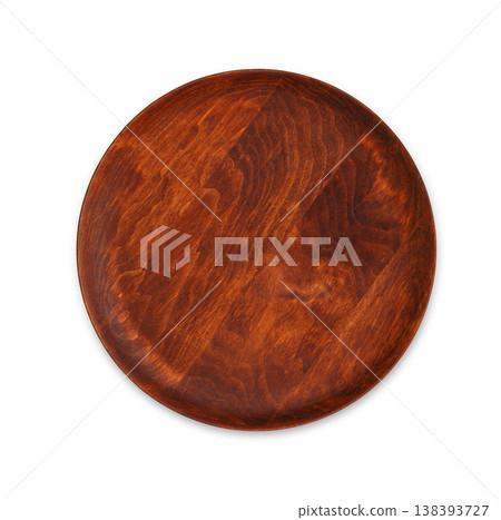 A round wood tray with copy space isolated on white background, top view 138393727