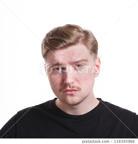 Disappointed. Negative emotion. Man with sad face, grimacing on white studio background, cutout Disappointed. Negative emotion. Man with sad face, grimacing on white studio background, cutout 138393966