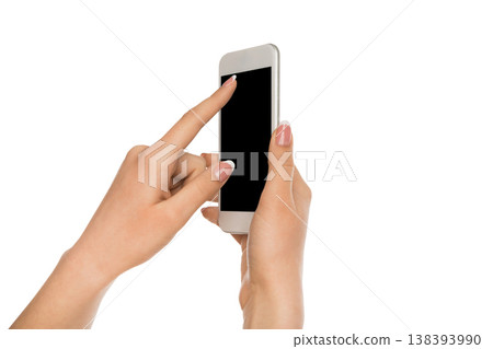 Touch screen with copy space. Mobile phone display, female hand holding modern smartphone and pointing with index finger on blank screen, white isolated background, copy space, cutout Touch screen with copy space. Mobile phone display, female hand holding modern smartphone and pointing with index finger on blank screen, white isolated background, copy space, cutout 138393990