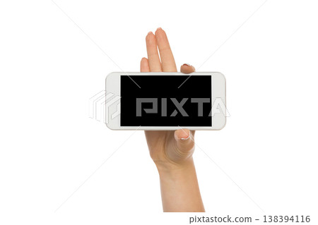 Woman hand touch mobile phone display, cutout. Female holding modern smartphone, white isolated background, copy space 138394116