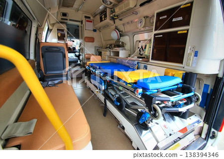 Inside the ambulance, the injured and sick are taken aboard and transported to a hospital or medical facility at high speed... Inside the ambulance, the injured and sick are taken aboard and transported to a hospital or medical facility at high speed... 138394346
