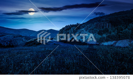 mountainous rural landscape in summertime at night. full moon over picturesque highland woods and grassy meadow. view of mysterious countryside scenery with forested hills behind the pasture mountainous rural landscape in summertime at night. full moon over picturesque highland woods and grassy meadow. view of mysterious countryside scenery with forested hills behind the pasture 138395078