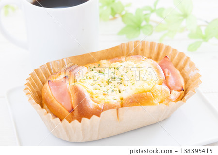 Delicious ham and egg roll and coffee Delicious ham and egg roll and coffee 138395415