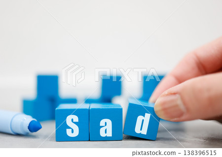 Sadness, the word "sad," blue blocks, emotional expression, mental health Sadness, the word "sad," blue blocks, emotional expression, mental health 138396515