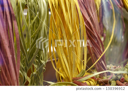 Fresh Homemade Pasta Nests on Tray Close Up Fresh Homemade Pasta Nests on Tray Close Up 138396912