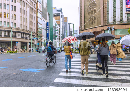 Japan's Tokyo urban landscape blue ticket system starts April 1st. Rainy Ginza and bicycles… Japan's Tokyo urban landscape blue ticket system starts April 1st. Rainy Ginza and bicycles… 138398094