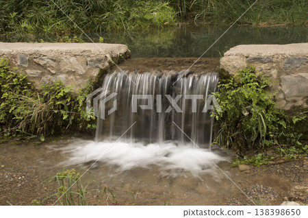 small waterfall found along the river small waterfall found along the river 138398650
