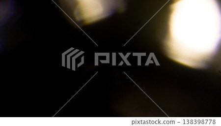 Abstract cinematic lens flare with bright light burst and star rays, isolated on black background. Optical light effect ideal for VFX overlays, transitions, titles and dramatic visual accents. Abstract cinematic lens flare with bright light burst and star rays, isolated on black background. Optical light effect ideal for VFX overlays, transitions, titles and dramatic visual accents. 138398778