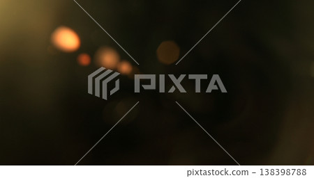 Abstract cinematic lens flare with bright light burst and star rays, isolated on black background. Optical light effect ideal for VFX overlays, transitions, titles and dramatic visual accents. Abstract cinematic lens flare with bright light burst and star rays, isolated on black background. Optical light effect ideal for VFX overlays, transitions, titles and dramatic visual accents. 138398788