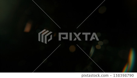 Abstract cinematic lens flare with bright light burst and star rays, isolated on black background. Optical light effect ideal for VFX overlays, transitions, titles and dramatic visual accents. Abstract cinematic lens flare with bright light burst and star rays, isolated on black background. Optical light effect ideal for VFX overlays, transitions, titles and dramatic visual accents. 138398790