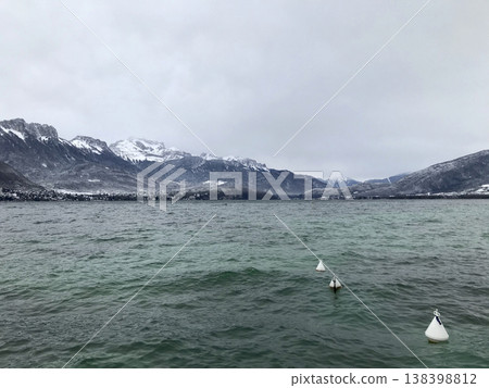 views from the shore of lake annecy after the last snowfall views from the shore of lake annecy after the last snowfall 138398812