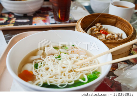 noodle soup meal with chopsticks and tea noodle soup meal with chopsticks and tea 138398932